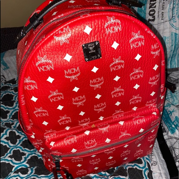 red mcm bookbag